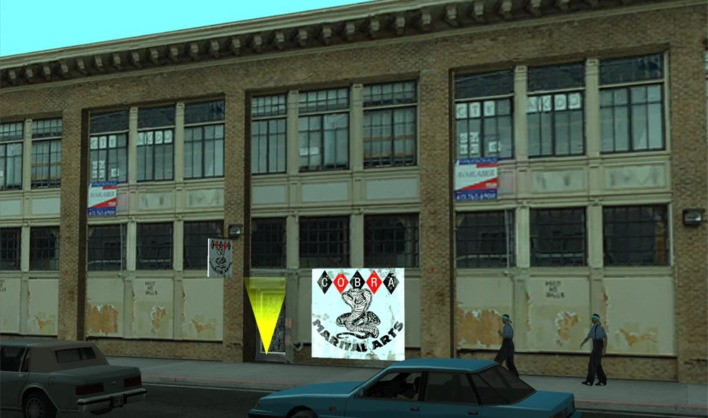 The Cobra Marital Arts Gym exterior — where Katie Zhan was supposed to spawn and train, before Rockstar benched her to the country club forever.