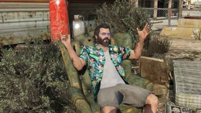 Michael post-Meltdown just vibing in a chair — zero connection to the Ron clone madness, but still peak GTA energy.