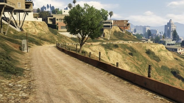 Gameplay shot cruising Hillcrest Ridge Access Road — looks like any other street, but carries a buried dev secret that only leaked source code finally exposed.
