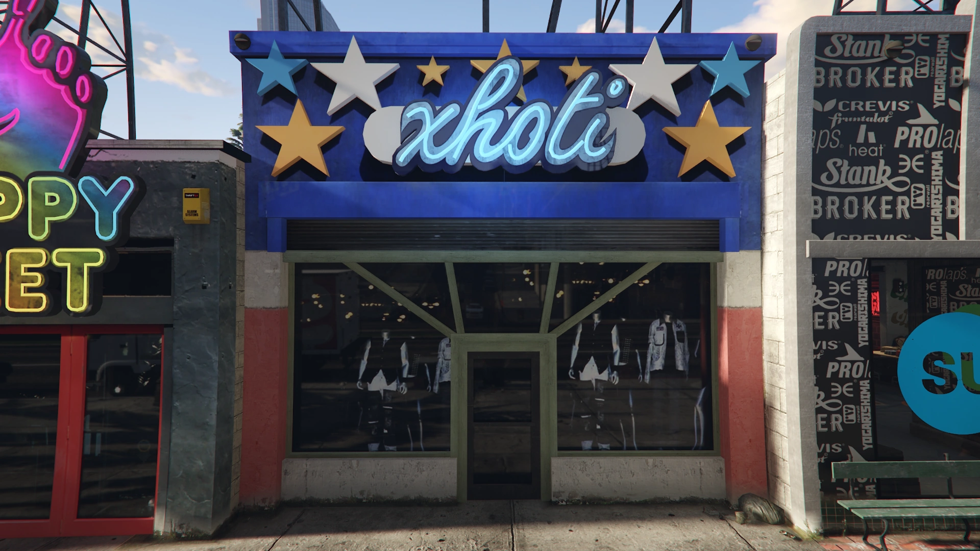 The sleek glass-front exterior of Xhoti in GTA V — Rockstar's second go at the same real Melrose boutique they already channeled into 'Spacey!' back in San Andreas.