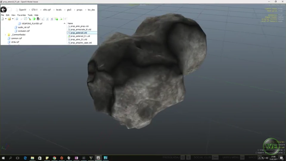 اسکرین‌شات از سیارک prop_asteroid.ytd که با ترینر اسپاون شده و داره یه ماشین رو زیر خودش له می‌کنه — همین جثه عظیمشه که باعث شده بازیکنا فکر کنن قرار بوده توی ماموریت فضایی یا DLC استفاده بشه.