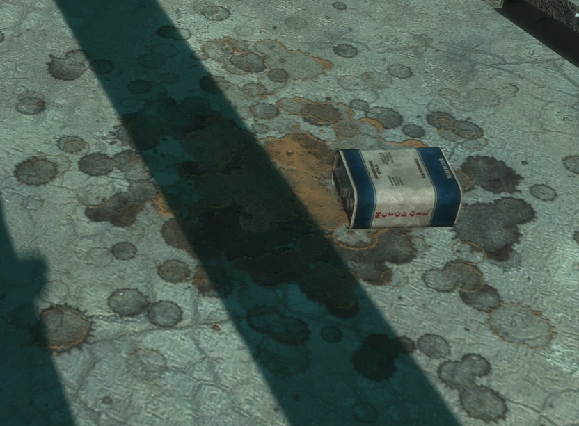 Motor oil — the kind of mundane item that makes the 'shoot the lock off' sign hit even darker.