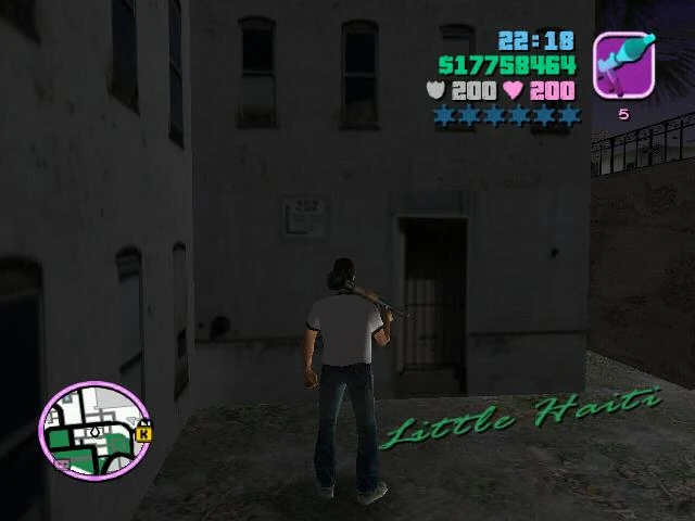 Wide shot of House No. 252 sitting weirdly isolated beside the Little Haiti cemetery, locked off and begging questions.