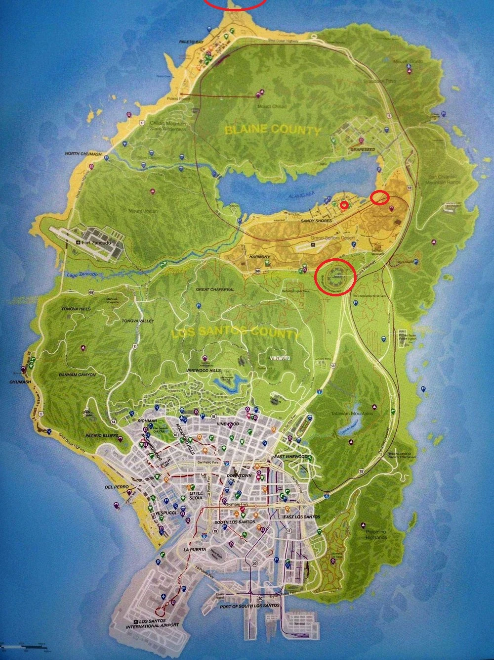 The tiny hand-drawn map itself, scrawled on Bolingbroke's walls, literally pointing players toward the islands north of Chiliad.